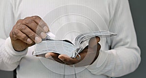 man praying to God worshipping with hands together with people stock image stock photo