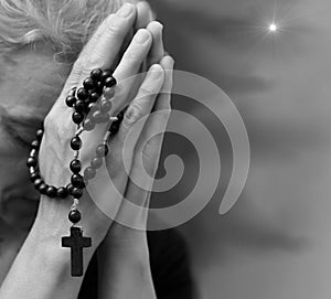 man praying to God worshipping with hands together with people stock image stock photo