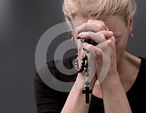 man praying to God worshipping with hands together with people stock image stock photo