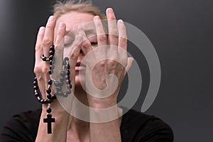 man praying to God worshipping with hands together with people stock image stock photo