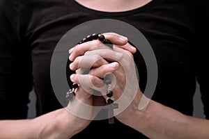 man praying to God worshipping with hands together with people stock image stock photo