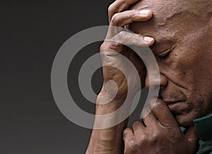 man praying to God worshipping with hands together with people stock image stock photo