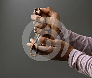 man praying to God worshipping with hands together with people stock image stock photo