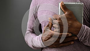 man praying to God worshipping with hands together with people stock image stock photo