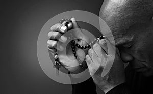 man praying to God worshipping with hands together with people stock image stock photo