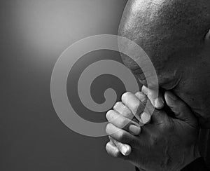 man praying to God worshipping with hands together with people stock image stock photo