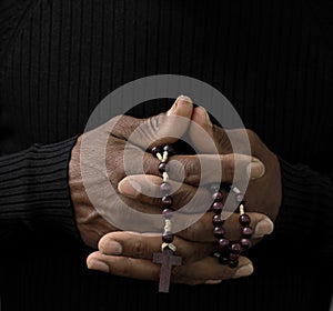 man praying to God worshipping with hands together with people stock image stock photo