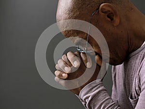 man praying to God worshipping with people stock image stock photo