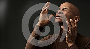 man praying to God worshipping with people stock image stock photo