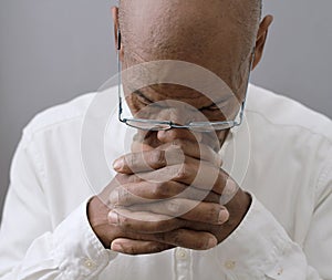 man praying to God worshipping with people stock image stock photo