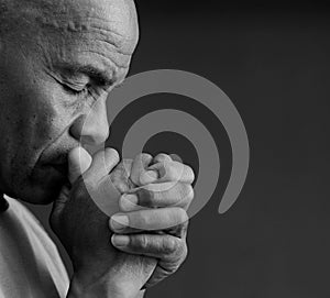 man praying to God worshipping with people stock image stock photo