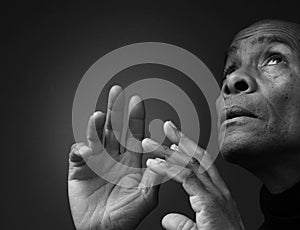 man praying to God worshipping with people stock image stock photo