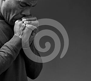 man praying to God worshipping with people stock image stock photo