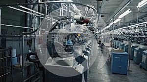 A man prepares a workplace at the garment factory