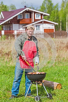 Man preparing barbecue