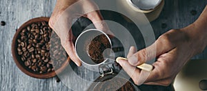 Man preparing coffee in a moka pot, web banner photo