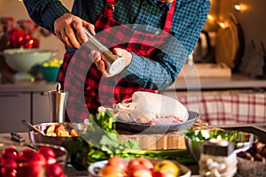 Man preparing delicious and healthy food in the home kitchen for christmas Christmas Duck or Goose