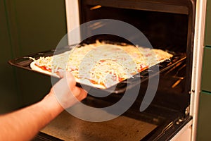 Man preparing pizza