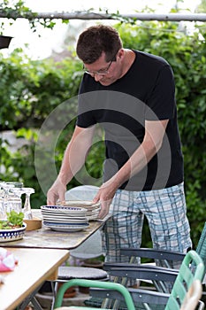 Man preparing plates