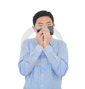 Man preparing to put on a mask in front of white background