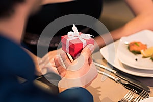 Man presenting a gift