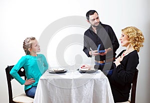 Man presenting the gift to woman