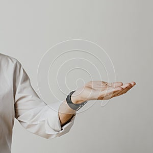 Man presenting thing on his palm