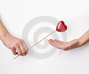 Man presents palm with love sign symbol