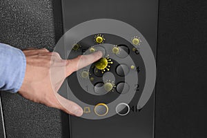 Man press button in elevator with germs, closeup