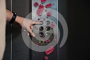 Man press button in elevator with germs, closeup