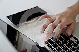 Man press turn off button laptop computer and turn off smartphone Social media disconnect and Technology ban social ban  and