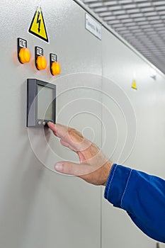 man presses a button control