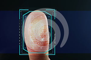 Man pressing control glass of biometric fingerprint scanner on color background, closeup with space for text.