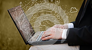 Man pressing notebook laptop computer with doodle icon cloud symbols