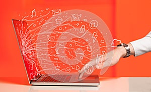 Man pressing notebook laptop computer with doodle icon cloud symbols