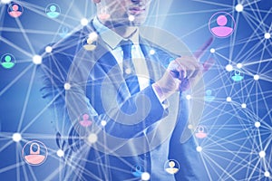 Man pressing virtual button on social network concept