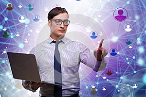 Man pressing virtual button on social network concept
