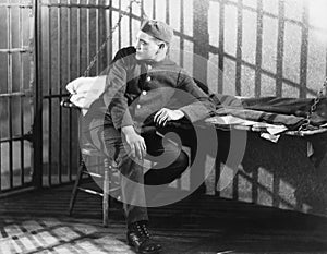 Man in prison cell