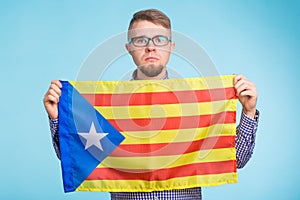 Man with pro-independence flag. Referendum For The Separation Of Catalonia From Spain Concept