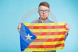 Man with pro-independence flag. Referendum For The Separation Of Catalonia From Spain Concept