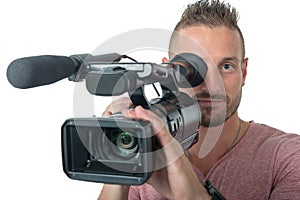 Man with professional camcorder isolated on white background