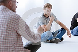 Man and professional counselor during psychotherapy for people with ptsd