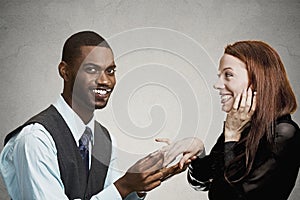 Man proposing to happy, excited woman photo