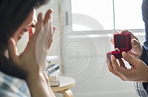 Man proposing to his girlfriend photo