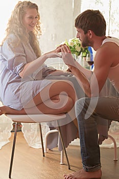 Man proposing to his girlfriend photo