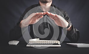 Man with protect gesture. Office workplace