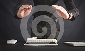 Man with protect gesture. Office workplace