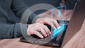 Man protecting personal data on a computer laptop and virtual interface. Cyber security concept to protect data. Secure encryption