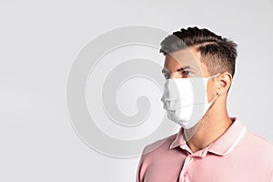 Man in protective face mask on white background