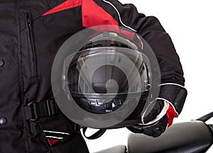 Man in protective gear with his motorbike